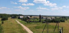 A house is for sale. A hangar, a plot of land for farming.