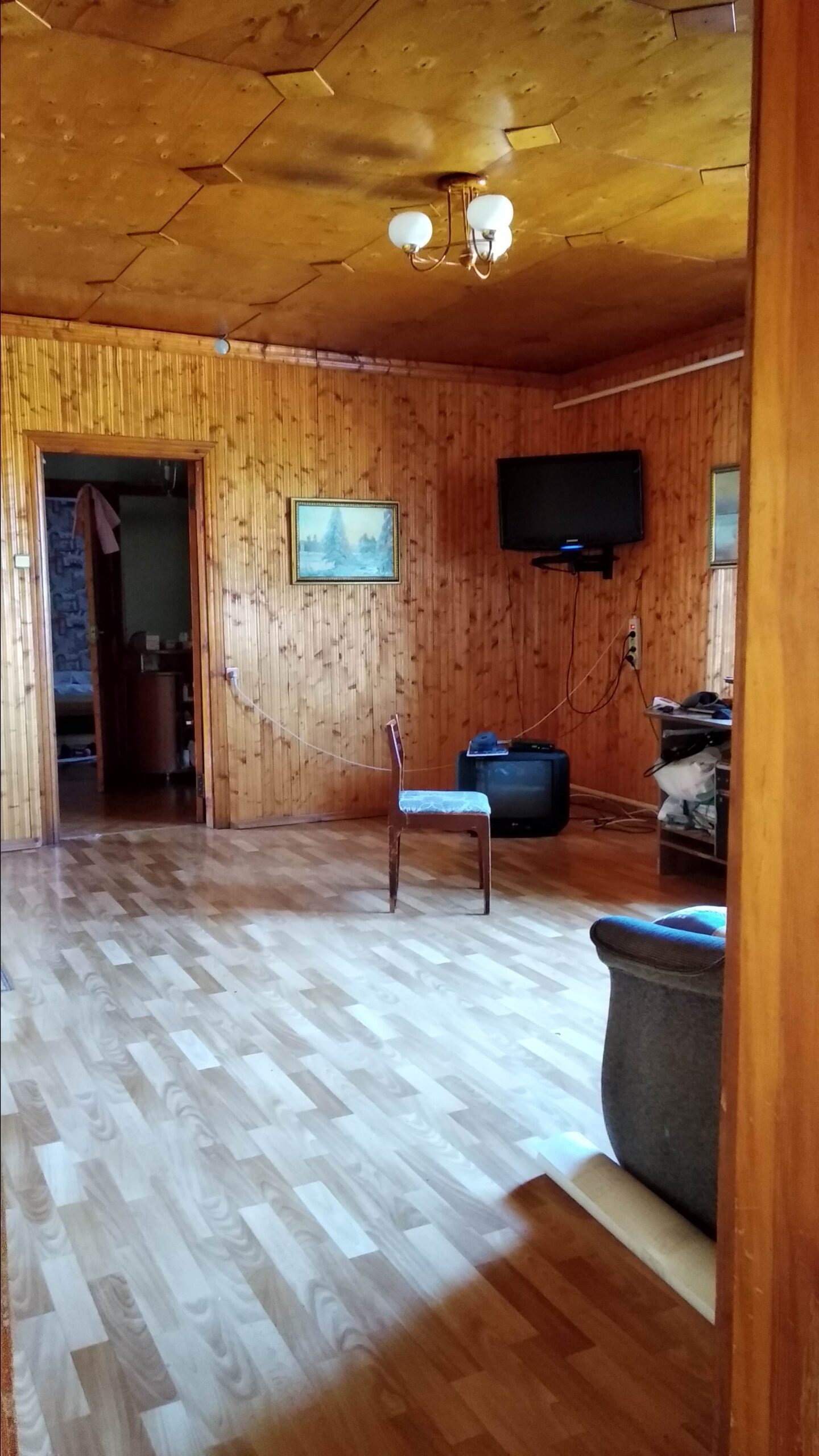 A house is for sale. A hangar, a plot of land for farming.
