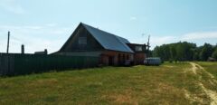 A house is for sale. A hangar, a plot of land for farming.