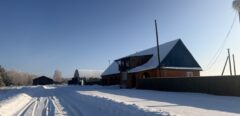 A house is for sale. A hangar, a plot of land for farming.