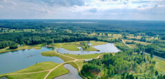 80 ha multifunctional investment property – fish farm, holiday homes, deer park – significant development potential.