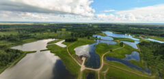 80 ha multifunctional investment property – fish farm, holiday homes, deer park – significant development potential.